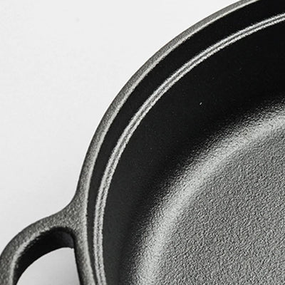 poele en fonte naturelle durable vue d'un rebord epais