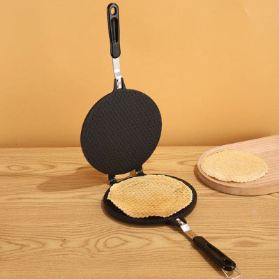 vus de la crepiere sur une table avec manche ergonomique