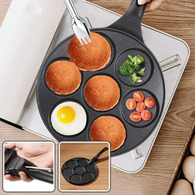 crepiere multi trous avec crepes legumes oeuf en cuisson