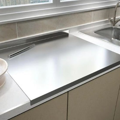 Grande planche à découper sur plan de travail et rebords