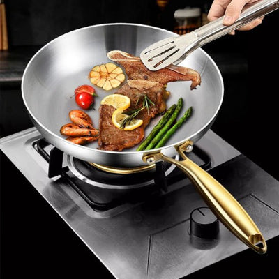 Poele inox cuisson steak sur gaz
