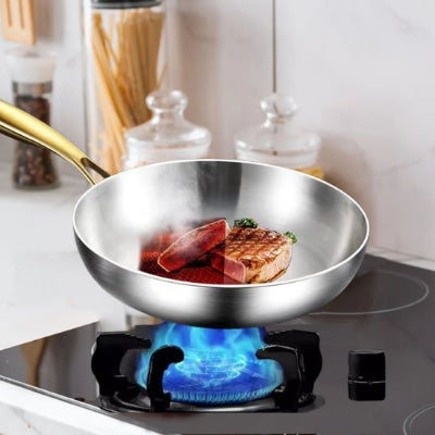 Poele inox cuisson steak sur gaz
